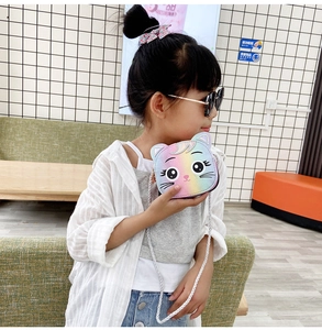 Close-up of children's sequined cat crossbody bag with colorful gradient effects