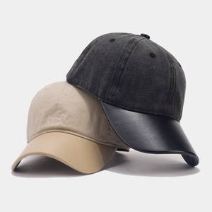 Retro baseball cap featuring cotton crown and contrasting leather brim in khaki and black