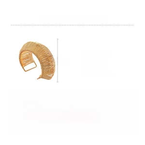 Detail showing dimensions and woven texture of a gold iron cuff bracelet with 6cm height