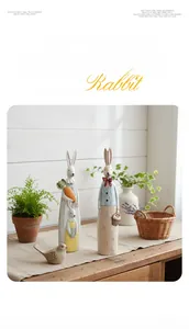 Detailed view of hand-painted resin rabbit figurines with a vintage wood carving texture