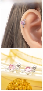 Detail of pink heart zircon stud earrings with cupid arrow and screw-back in silver finish
