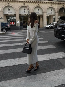 Elegant off-shoulder white knitted midi dress featuring pleated details for a slim fit