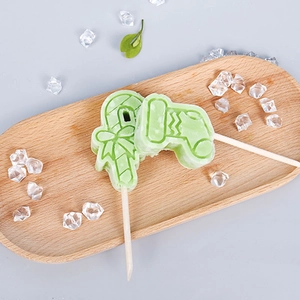 Christmas silicone ice cream mold with candy cane and sock shapes in light green color
