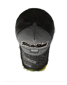 Close-up of vintage embroidered baseball cap with 1969 print and distressed frayed edges