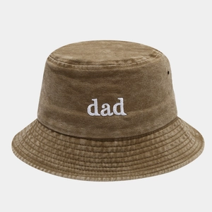 Close-up of vintage washed cotton bucket hat with white dad embroidery and metal eyelets