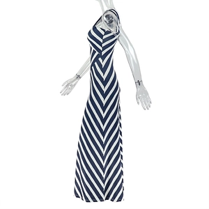 Detail view of the striped maxi dress featuring blue and white diagonal patterns