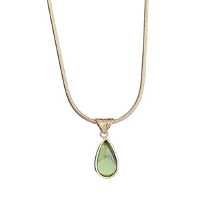 Elegant gold snake chain necklace featuring a pear-shaped green gemstone pendant