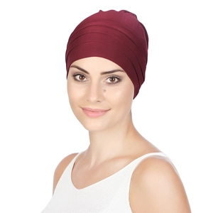 Detailed close-up of wine red pleated headwrap hat featuring soft elastic fabric for women