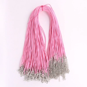 Close-up of pink wax cord necklace strands with silver lobster clasp and extension chain