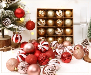 Detail of assorted 6cm Christmas baubles in matte and glitter finishes in a 16-grid box