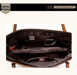 Detail view of large capacity oil wax leather handbag with multiple interior pockets