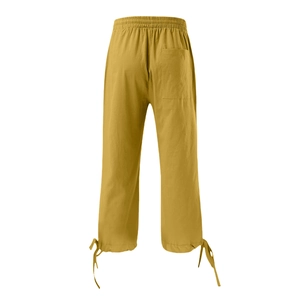 Rear view of ginger cotton linen wide leg trousers with elastic waist and bow drawstring cuffs