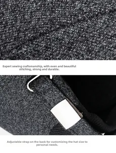 Detail of grey winter baseball cap showing thick fabric texture and metal buckle
