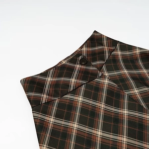 Plaid A-line skirt with asymmetric waist design in brown and dark green tartan pattern