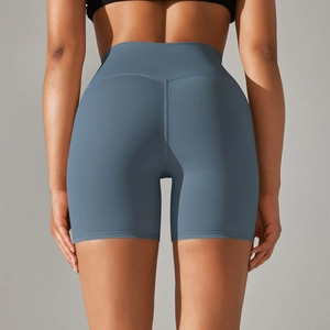 Detail view of high-waisted yoga shorts with V-shaped stitching for booty lifting
