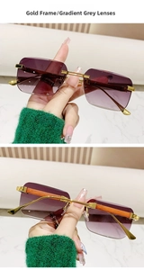 Detail of square rimless sunglasses with gradient grey lenses and wood grain temples