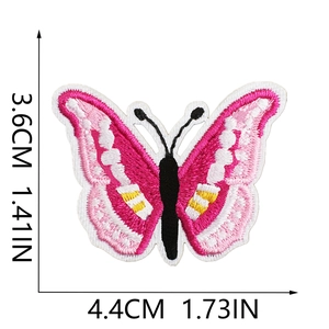 Detailed view of pink butterfly embroidery patch measuring 4.4cm by 3.6cm with measurements
