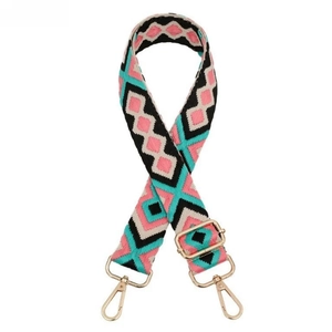 Detail of adjustable 3.8cm wide woven bag strap with geometric diamond patterns and gold hooks