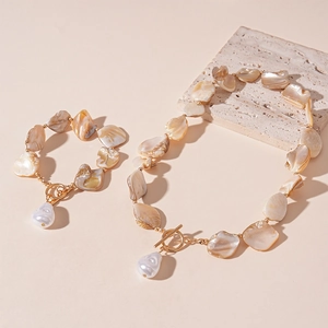 Irregular shell and faux pearl necklace set with golden T-bar toggle clasp jewelry