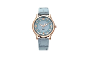 Close-up of women's quartz watch with blue dial, rose gold case, and leather strap