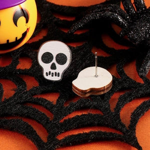 Halloween skull stud earrings with wooden texture and gothic spider web backdrop