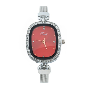 Elegant women's quartz watch with red oval dial, rhinestone bezel and silver mesh strap