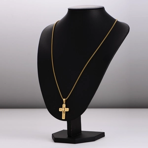 Elegant gold cross pendant necklace displayed on a black neck mannequin for couples