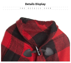 Detailed view of toggle button closure and red buffalo plaid fabric on wool cape