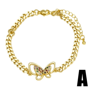 Golden Cuban chain bracelet with colorful zircon butterfly pendant on white background