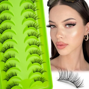 Detail of 10 pairs natural thick half false eyelashes with transparent bands on green tray