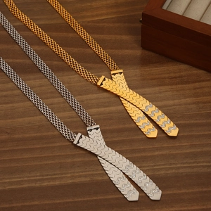 18K gold plated titanium cross pendant necklaces with diamonds on wood background