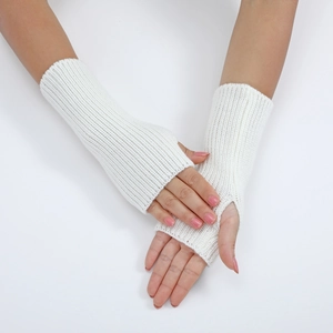 Close-up of white striped knit fingerless gloves showing detailed arm sleeve texture