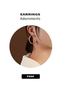 Close-up of chunky 18k gold plated hoop earrings on model with minimalist punk style