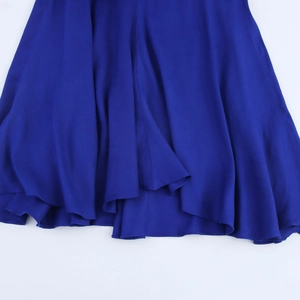 Elegant sleeveless blue faux linen dress with a long flowy hemline and soft drape texture