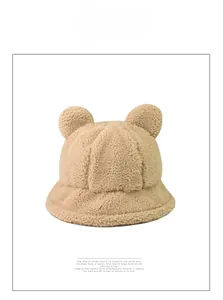 Close-up of the thick khaki faux shearling texture and cute 3D bear ears on bucket hat