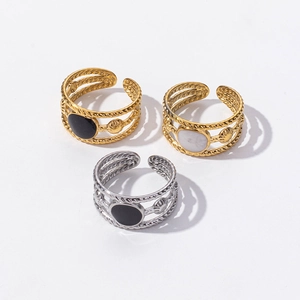 Three minimalist stainless steel open rings with shell and black enamel round accents