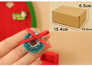 Miniature Christmas wreath with red bow and dimensions of the brown craft paper box