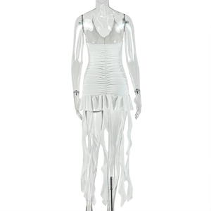 White halter dress back view showing textured pleats, ruffles, and flowing tassels