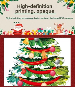 Close-up of static Christmas tree sticker with bells, gingerbread man and festive ornaments