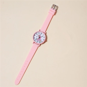 Kids quartz watch with pink silicone strap featuring a unicorn floral design dial