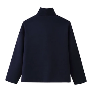 Detailed back view of a navy blue long-sleeved turtleneck knit top on white background