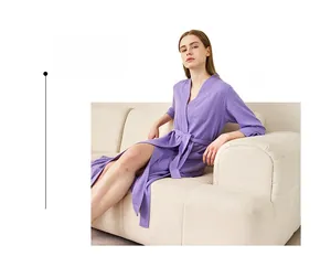 Detail of light purple waffle knit bathrobe with textured fabric and belt closure