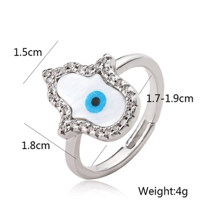 Detailed view of Hamsa Hand ring with evil eye stone and size measurement specs