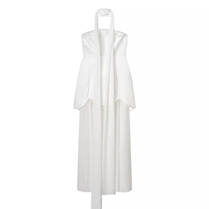 Detailed view of white satin halter dress featuring elegant pearl neck embellishments