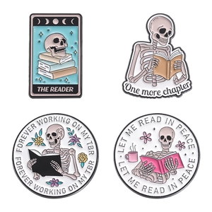 Set of four skeleton reading enamel pins with the reader and let me read in peace quotes
