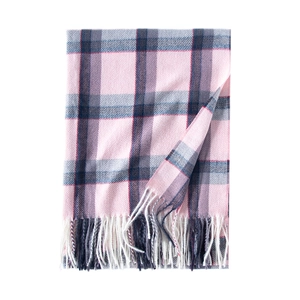 Pink and dark blue plaid cashmere scarf with soft tassels on plain white background