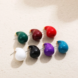 Set of seven colorful teardrop stainless steel stud earrings in polished golden finish