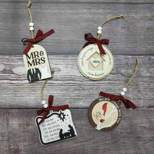 Set of 4 wooden Christmas ornaments with red plaid ribbons and beads on dark wood