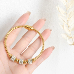 Luxurious 18K gold-plated snake bone bracelet with shimmering pavé crystal beads