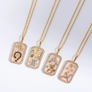 Gold stainless steel zodiac necklaces with colorful enamel pendants and sparkling zircons